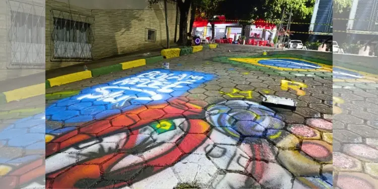 Arte urbana na Copa: muralista Vinicius Graffit pinta rua em Colatina para campanha publicitária - Foto: Divulgação